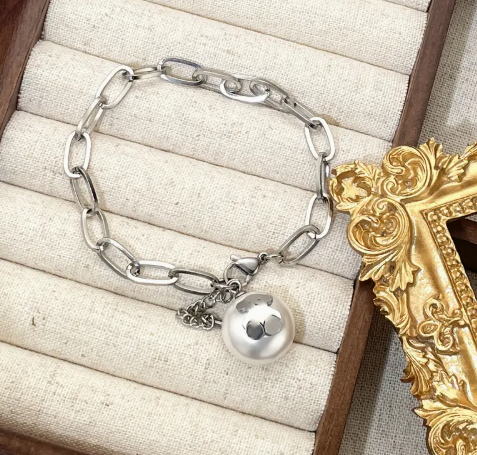 T❸❸💫Pulsera elegante de acero de titanio con dije de oso