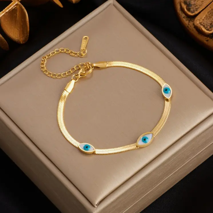 T❹❾💥 Pulsera Elegante Retro de Acero Inoxidable con Diseño de Ojo Azul y Hoja Dorada