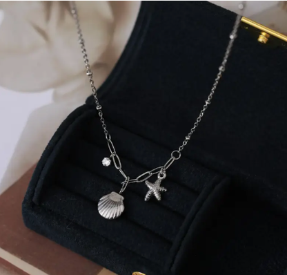 T❹❻🌹Collar elegante de concha de acero inoxidable y estrella de mar para mujeres