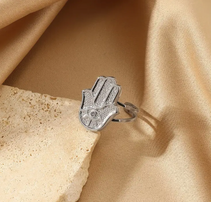 T❹❻🌹Anillo de palma de acero inoxidable de tono dorado con detalle de ojo de zircón