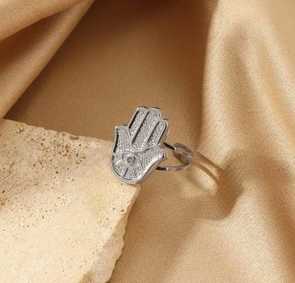 T❹❻🌹Anillo de palma de acero inoxidable de tono dorado con detalle de ojo de zircón