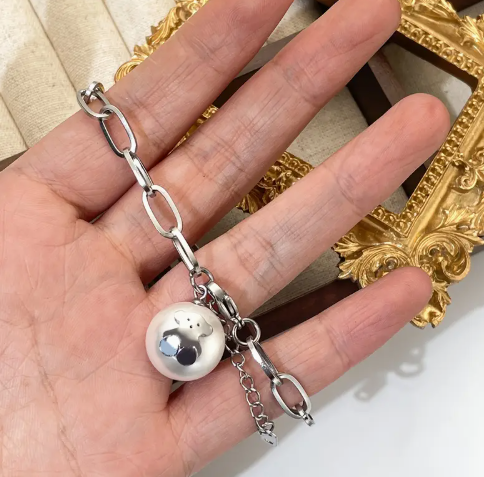 T❸❸💫Pulsera elegante de acero de titanio con dije de oso