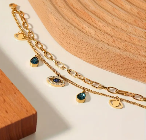 T❹❾💥 Elegante pulsera de doble ojo con placa dorada de 18K