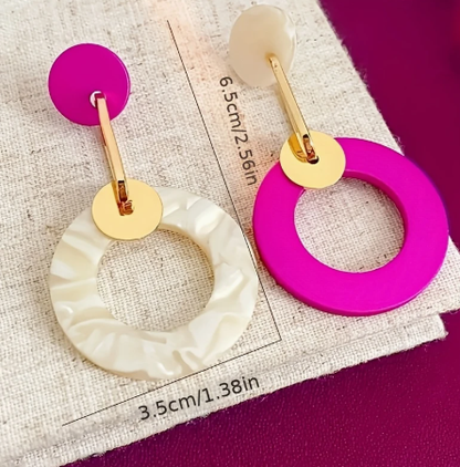 T❹❺🦋Un par de pendientes de aro asimétricos